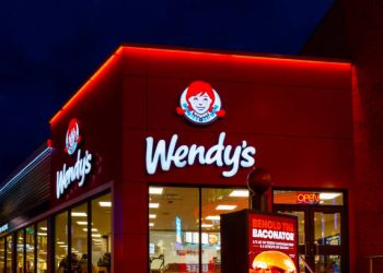 People in the  Wendy's restaurant at dusk in Niagara Falls, Ontario, Canada, on December 8, 2023. Wendy's is an American international fast food restaurant chain.