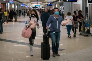 Flyers at Hartsfield-Jackson Atlanta International Airport wearing facemasks on March 6th, 2020 as the COVID-19 coronavirus spreads throughout the United States.