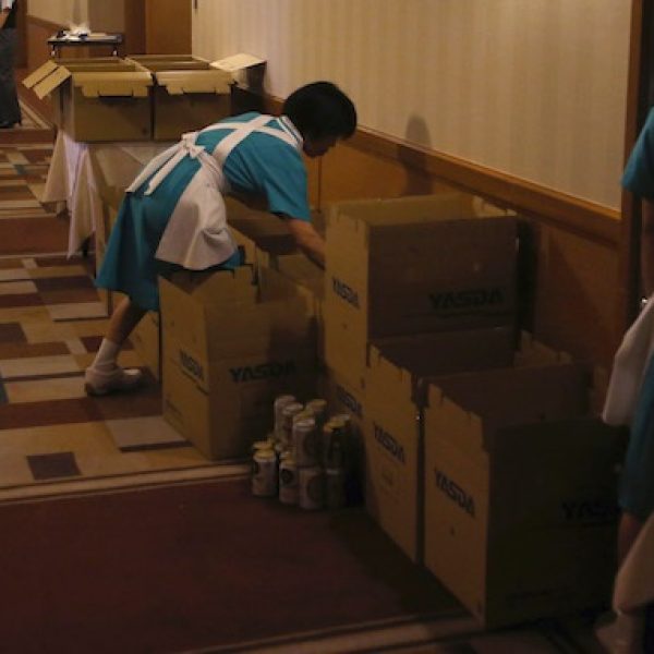Hotel employees clean rooms at Hotel Okura in Tokyo, Monday, Aug. 31, 2015.  The Hotel Okura, a favored Tokyo lodging for U.S. presidents, movie stars and other celebrities, is closing the doors of its iconic, half-century-old main building on Monday, Aug. 31, 2015, to make way for a pair of glass towers ahead of the 2020 Olympics. (AP Photo/Shizuo Kambayashi)