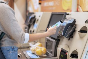 person-paying-with-its-smartphone-wallet-app (1)