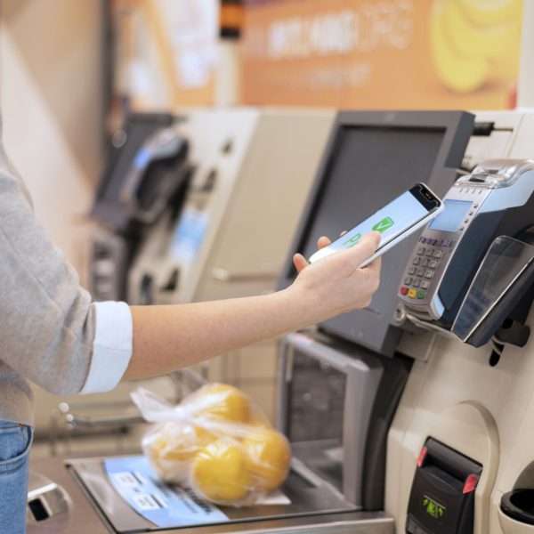 person-paying-with-its-smartphone-wallet-app (1)