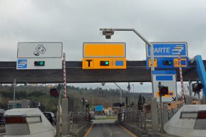 Impruneta, FI, Italy - February 19, 2023: motorway toll booth for toll payment and preferential lane for Telepass Radar