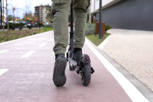 young-adult-using-electric-scooter-transportation